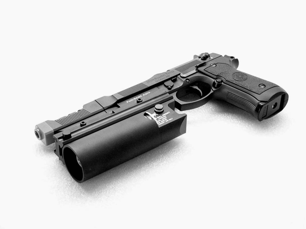 XM203